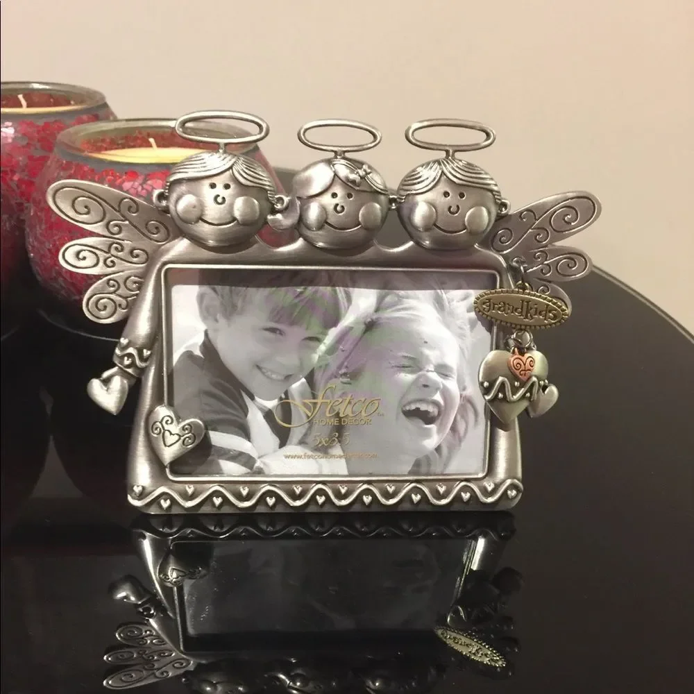 Two silver frames. Family and grandkids